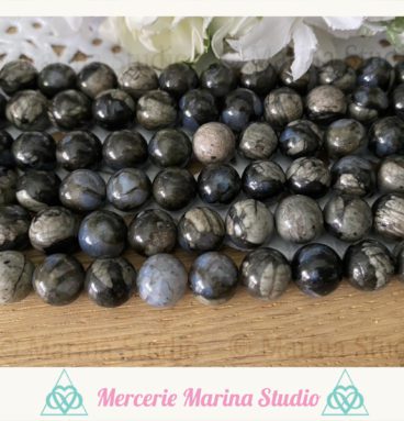 Lot de perles en llanite 8mm - biotite inclusions de microline  - origine texas