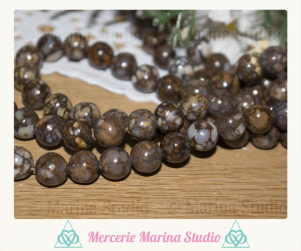 Lot de perles en llanite marron 8mm - biotite inclusions de microline - origine texas