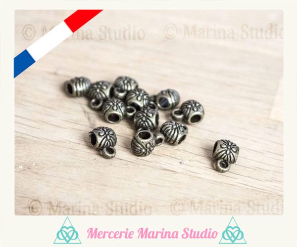 10 Jolies bélières bronze avec fleurs gravées 9x6mm