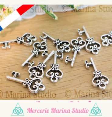 5 breloques clés en argent tibétain 21x9mm