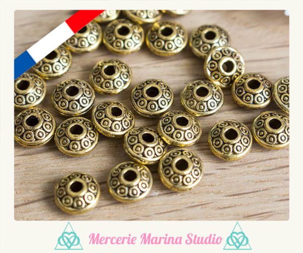10 Superbes perles intercalaires ajourées couleur doré ancien 6.5x4mmmm