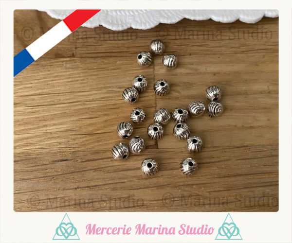 Lot de 10 perles rondes filigranées en métal argenté 4mm